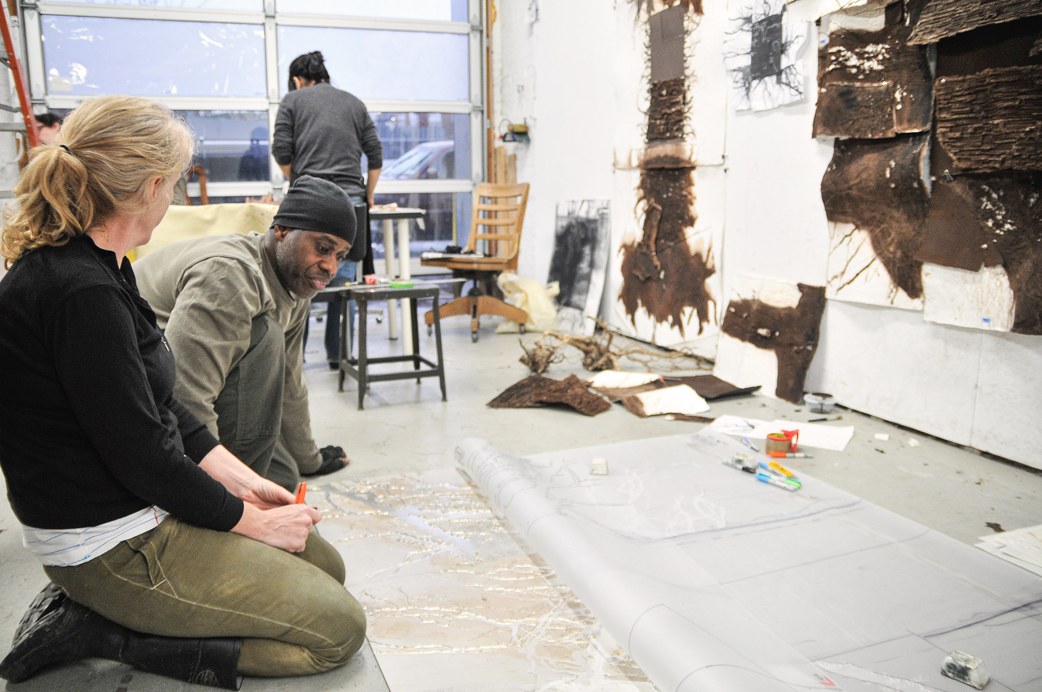 Leonardo Drew with Master Papermaker Ruth Lingen at Pace Paper, 2012.