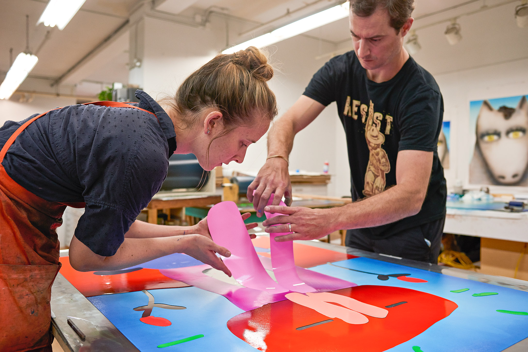 Sarah Carpenter and Justin Israels inking an Austin Lee monoprint