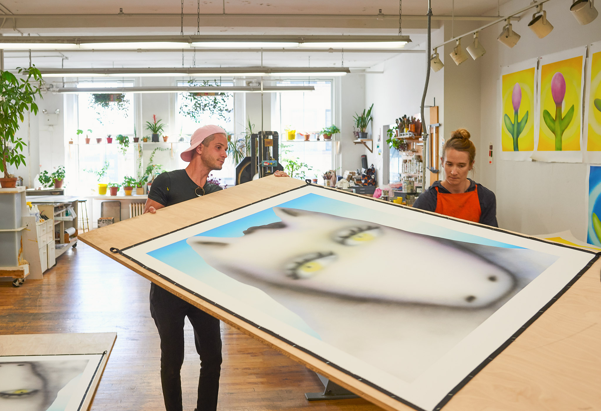 Austin Lee in the Pace Editions studios with works in progress.