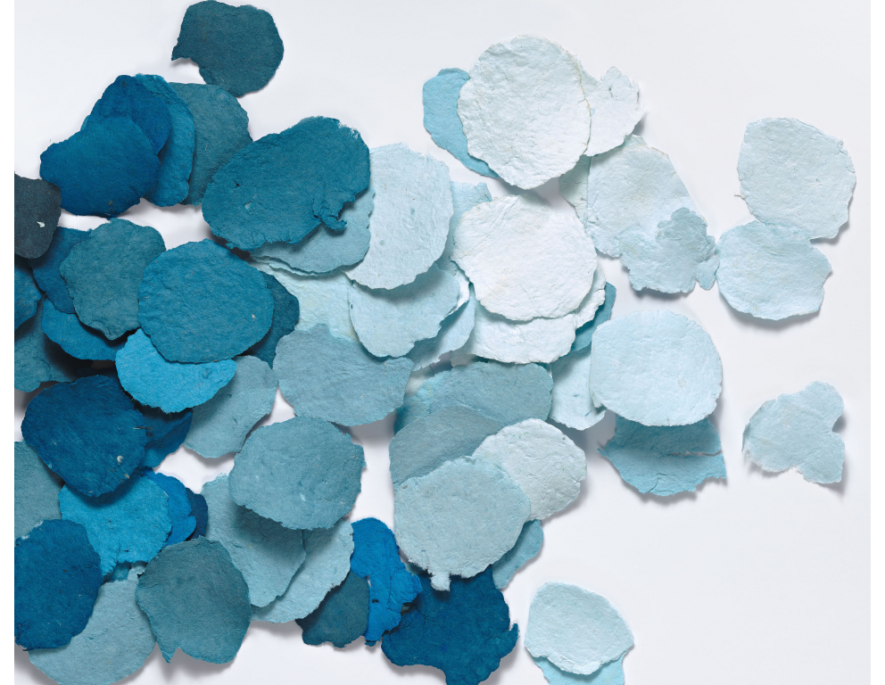 Samples of pigmented handmade cotton paper in shades of blue